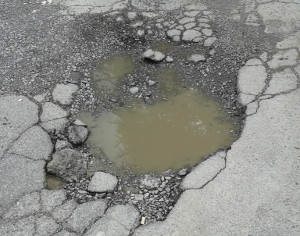 /cratere_buco_asfalto